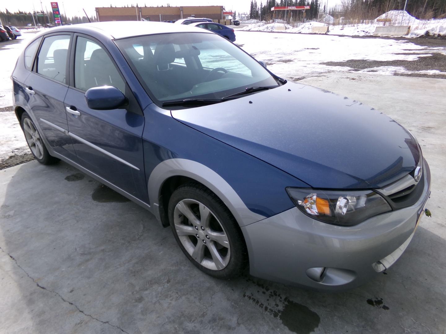 2011 Blue Subaru Impreza Outback Sport (JF1GH6D63BH) with an 2.5L H4 SOHC 16V engine, Automatic transmission, located at 2630 Philips Field Rd., Fairbanks, AK, 99709, (907) 458-0593, 64.848068, -147.780609 - Photo#0